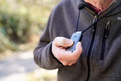 Image of the Belle X Medical Alert Response System, featuring a sleek, wearable device with an emergency button, designed for quick access to medical assistance