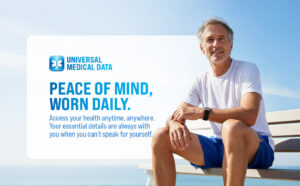 Senior man wearing a Sport Medical Alert Bracelet while sitting outdoors, highlighting everyday medical ID protection, emergency medical records access, QR medical bracelet technology, and personal health records for adults and seniors.